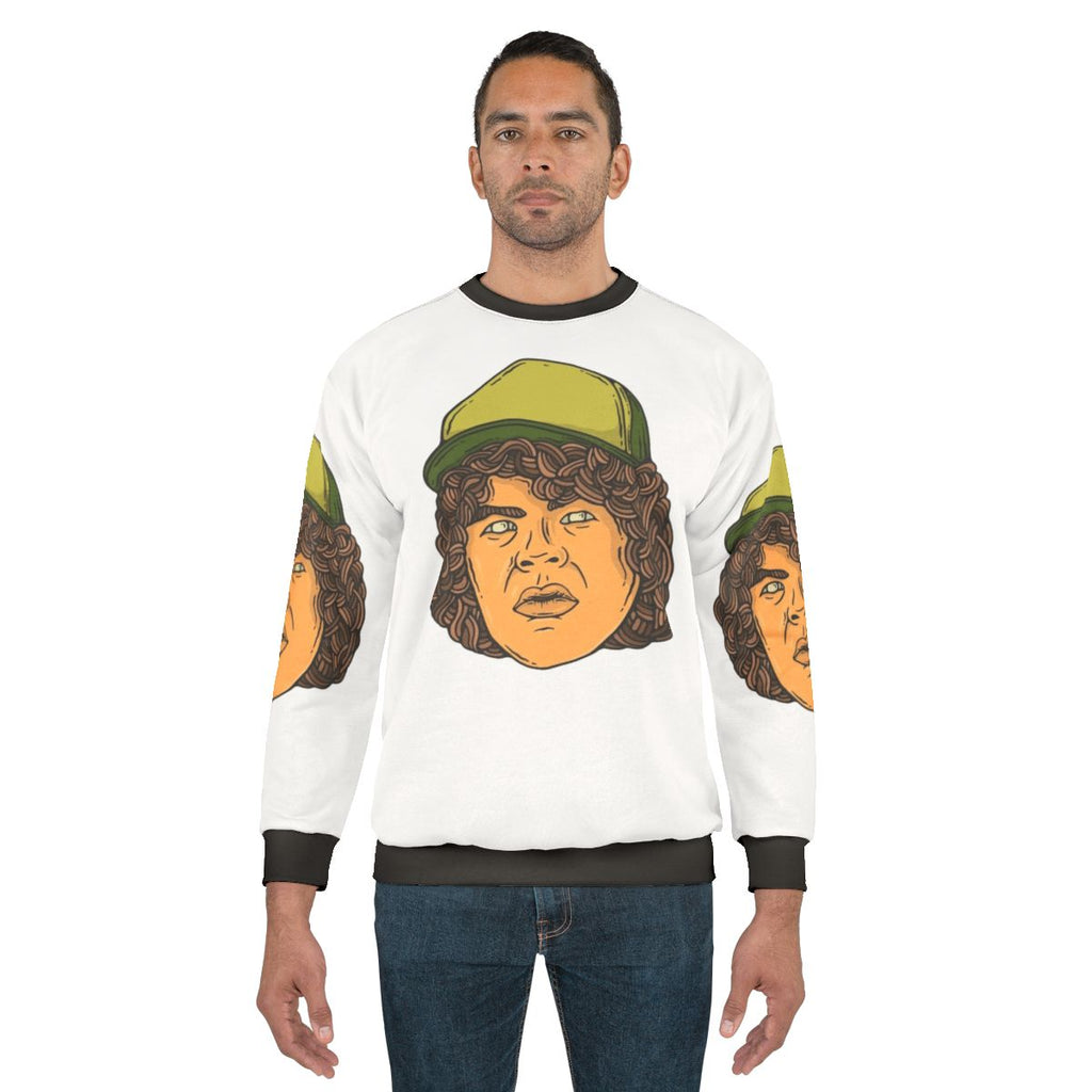 Dustin Henderson from Stranger Things wearing a sweatshirt