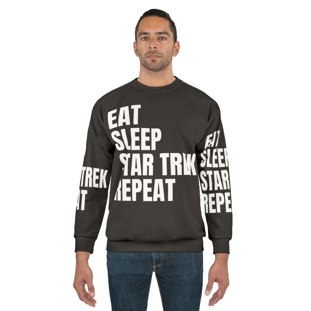 Stylish "Eat Sleep Star Trek Repeat" sweatshirt featuring the USS Enterprise NCC-1701