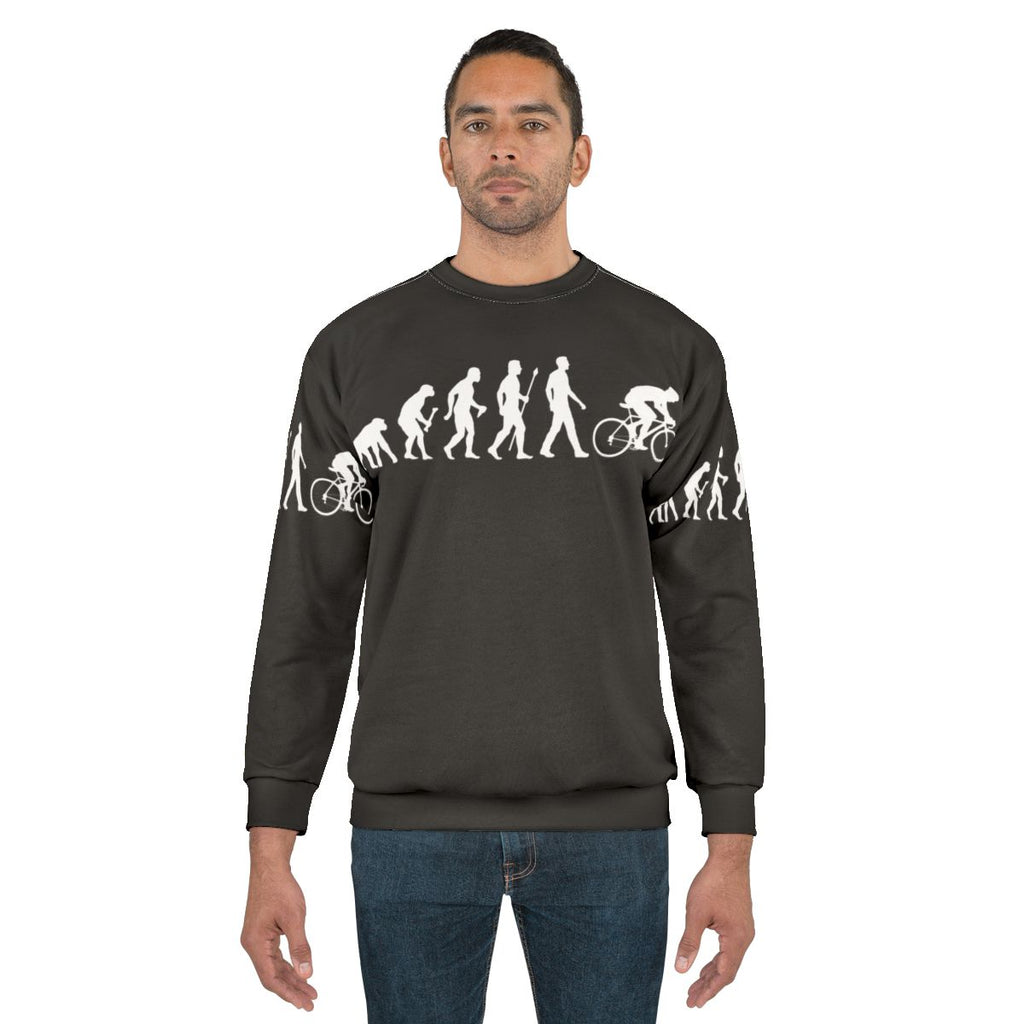 Cycling evolution sweatshirt with humorous cyclist silhouette