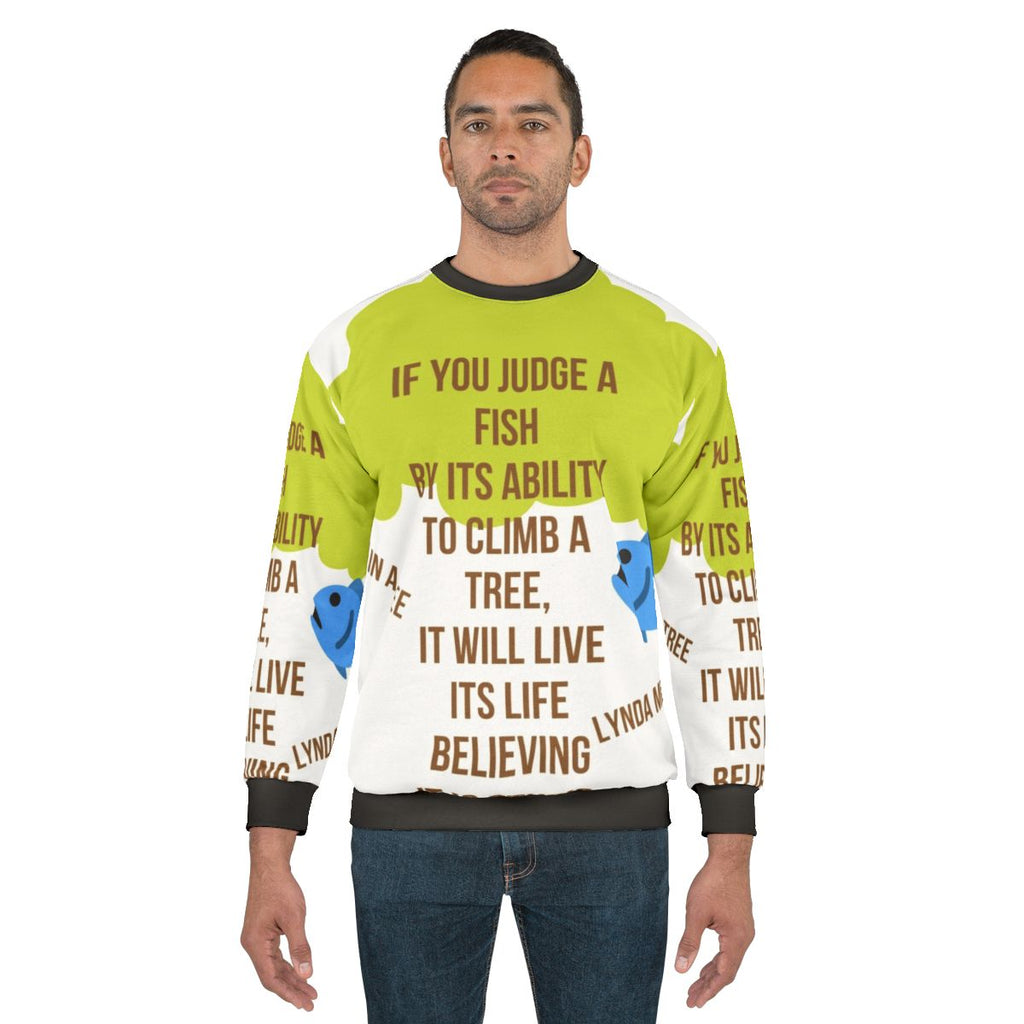 Cozy sweatshirt featuring the literary quote "Fish in a Tree" from the book by Lynda Mullaly Hunt