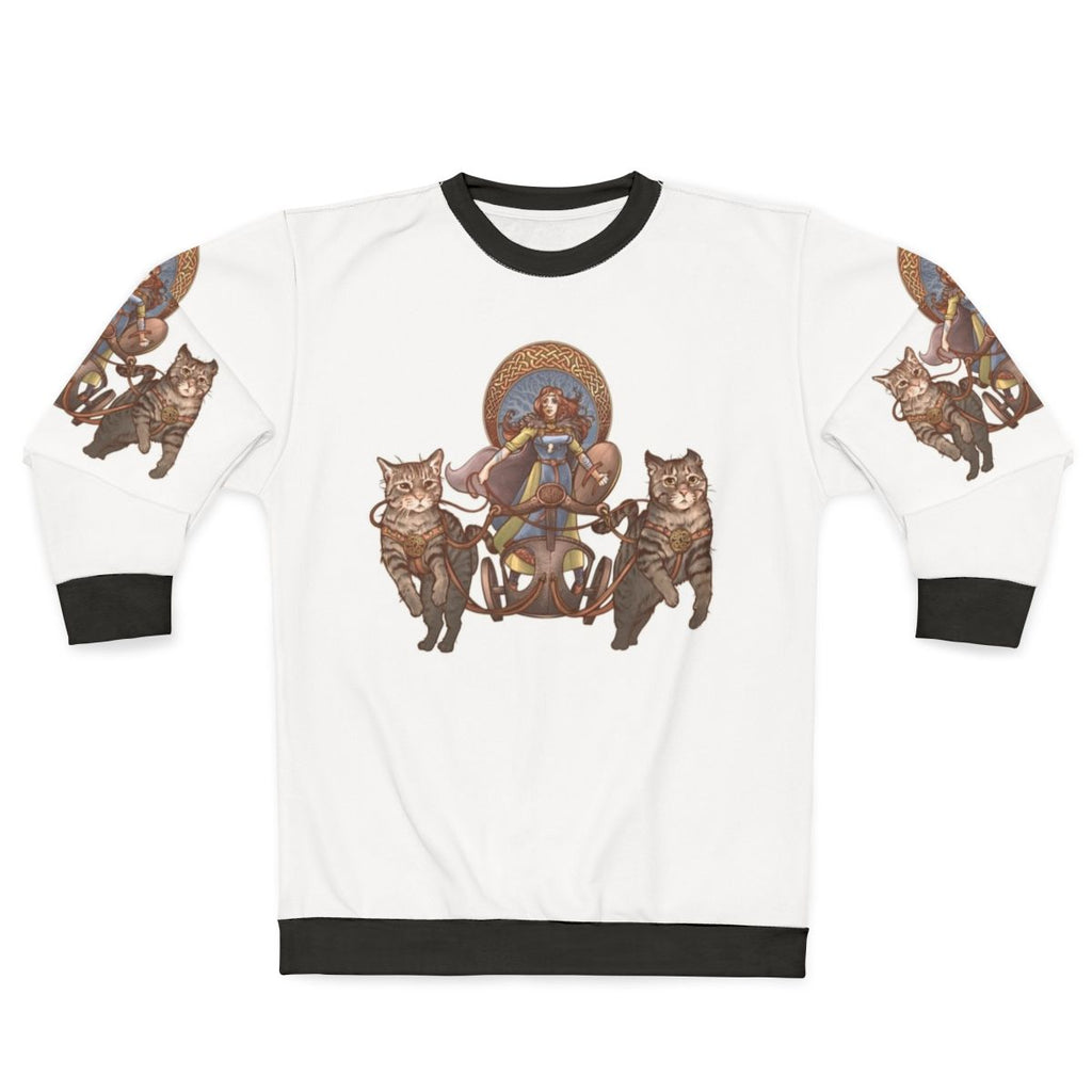 Freya, the Norse goddess, riding a chariot pulled by cats in a design with Celtic knotwork