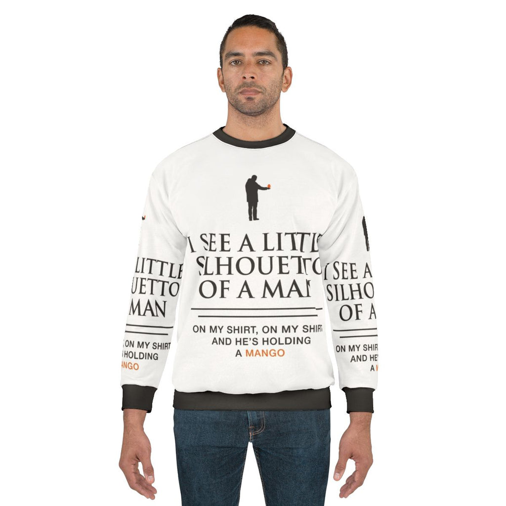 Mango-themed sweatshirt with funny music lyrics