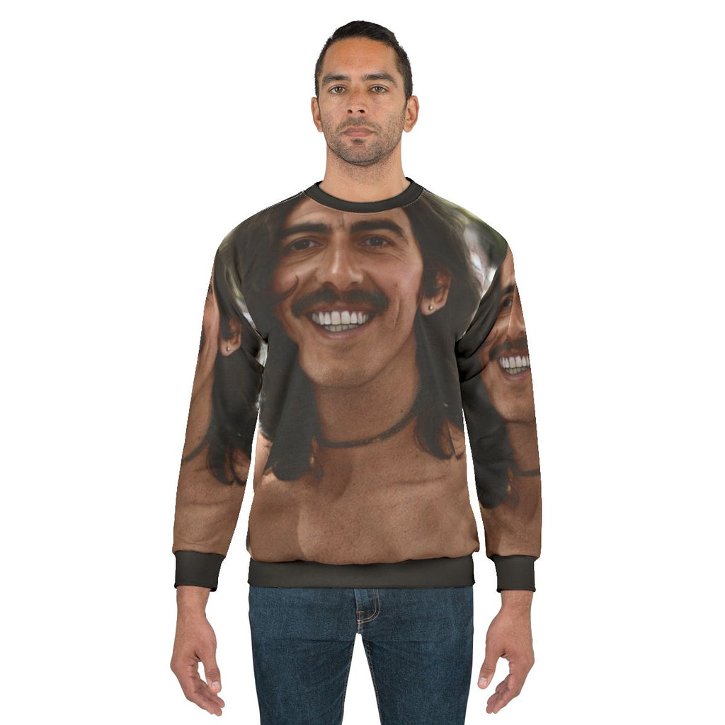 Colorful sweatshirt featuring a colourised image of George Harrison, the legendary Beatles musician