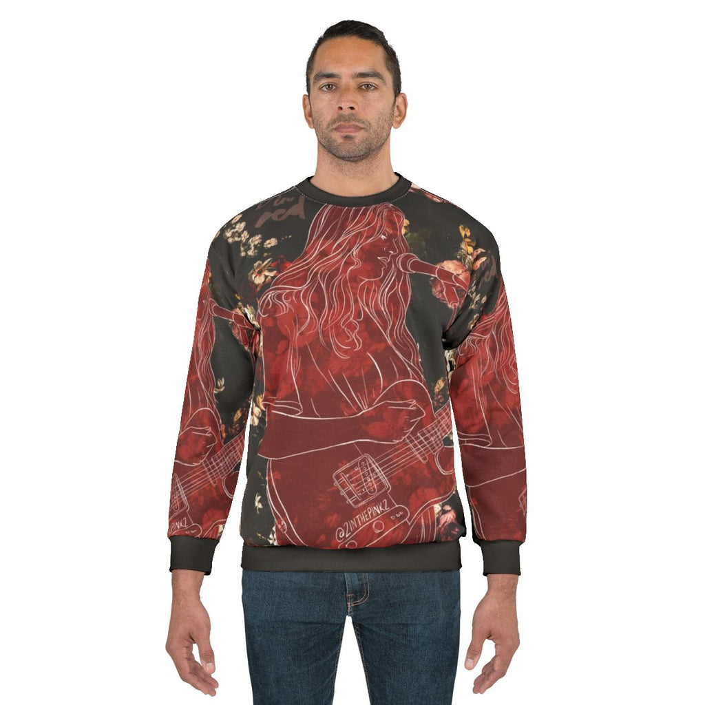 Girl in Red themed sweatshirt with roses
