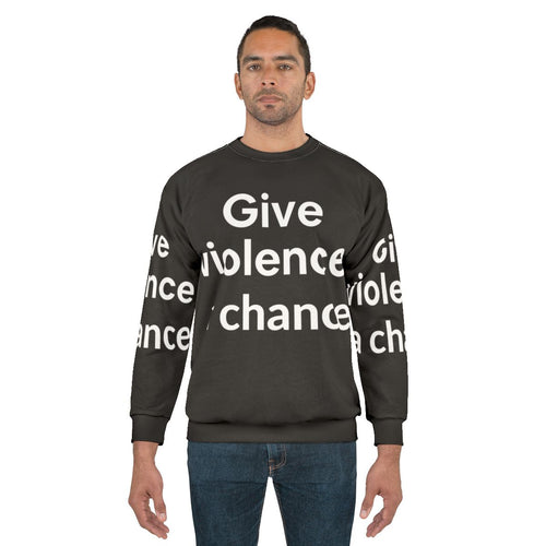 Anti-violence sweatshirt with "Give Violence a Chance" graphic design