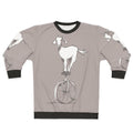Goat on a unicycle printed on a cozy sweatshirt