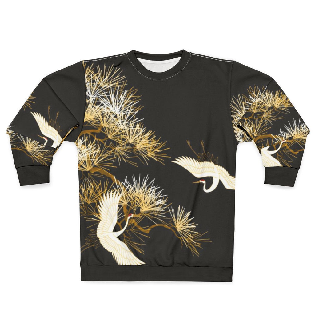 Elegant golden Japanese cranes embroidered on a black sweatshirt