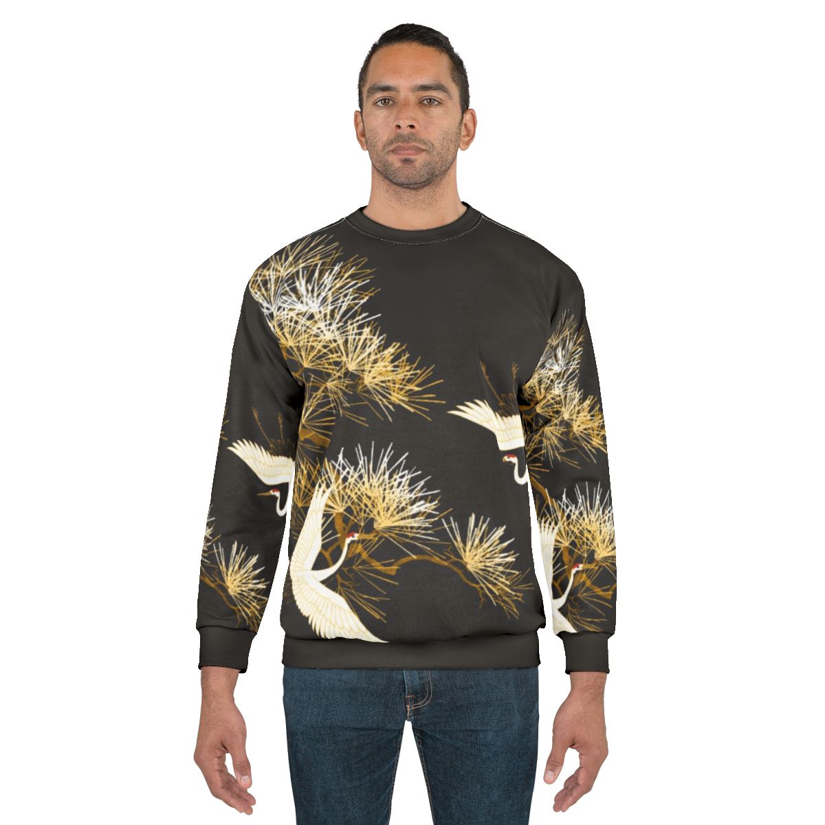 Elegant golden Japanese cranes embroidered on a black sweatshirt