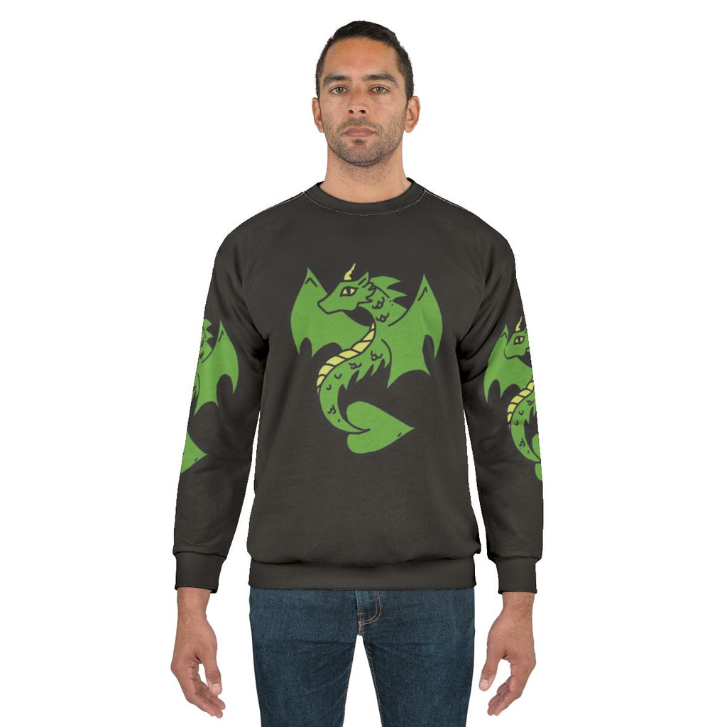 Green dragon design on a cozy sweatshirt for fantasy enthusiasts
