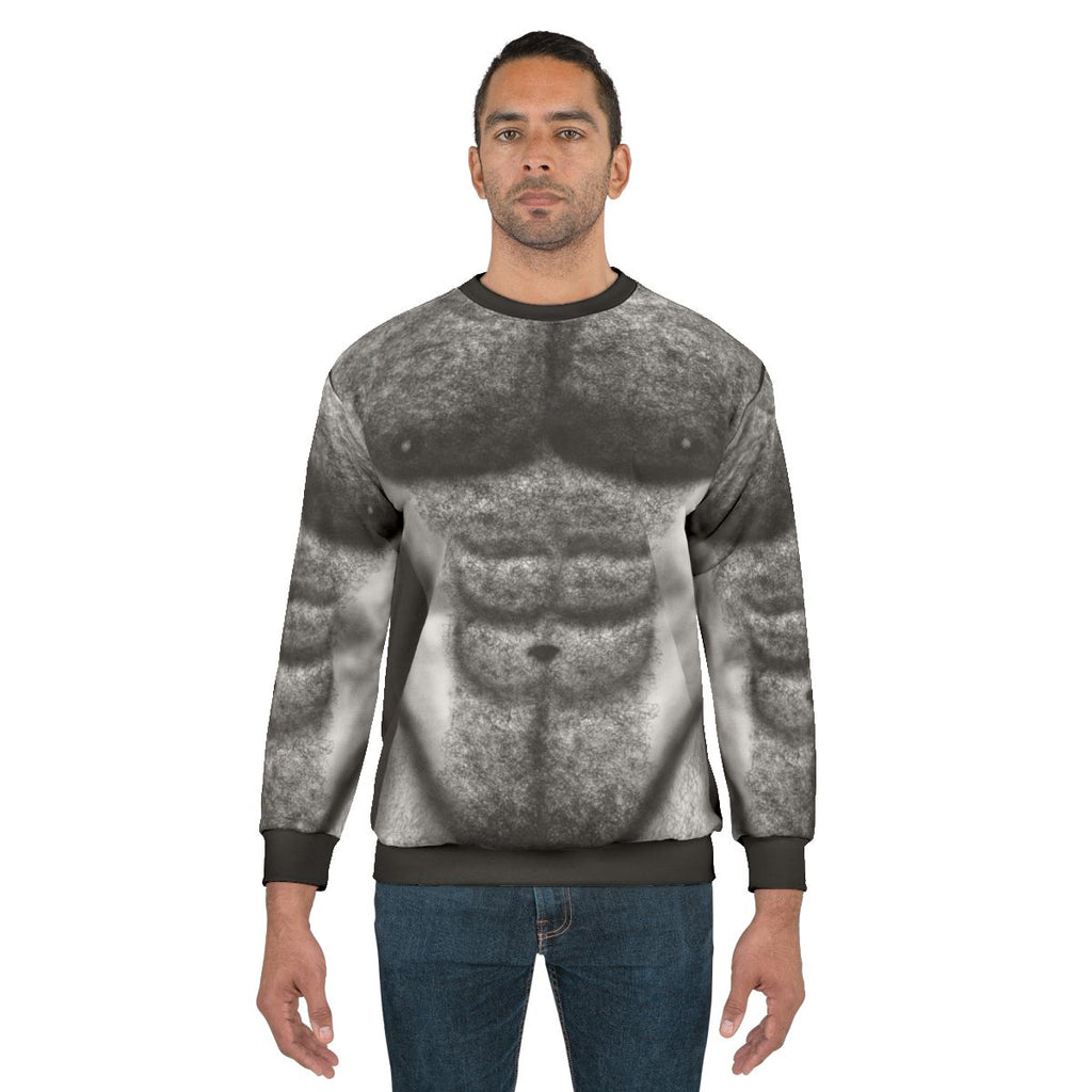 Hairy torso of a muscular male wearing a sweatshirt