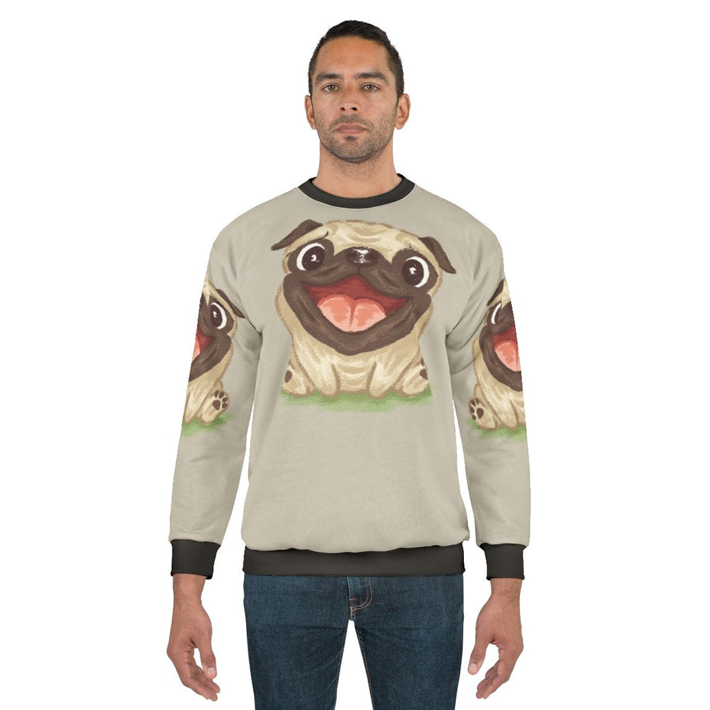 Smiling pug dog wearing a pastel pug sweatshirt