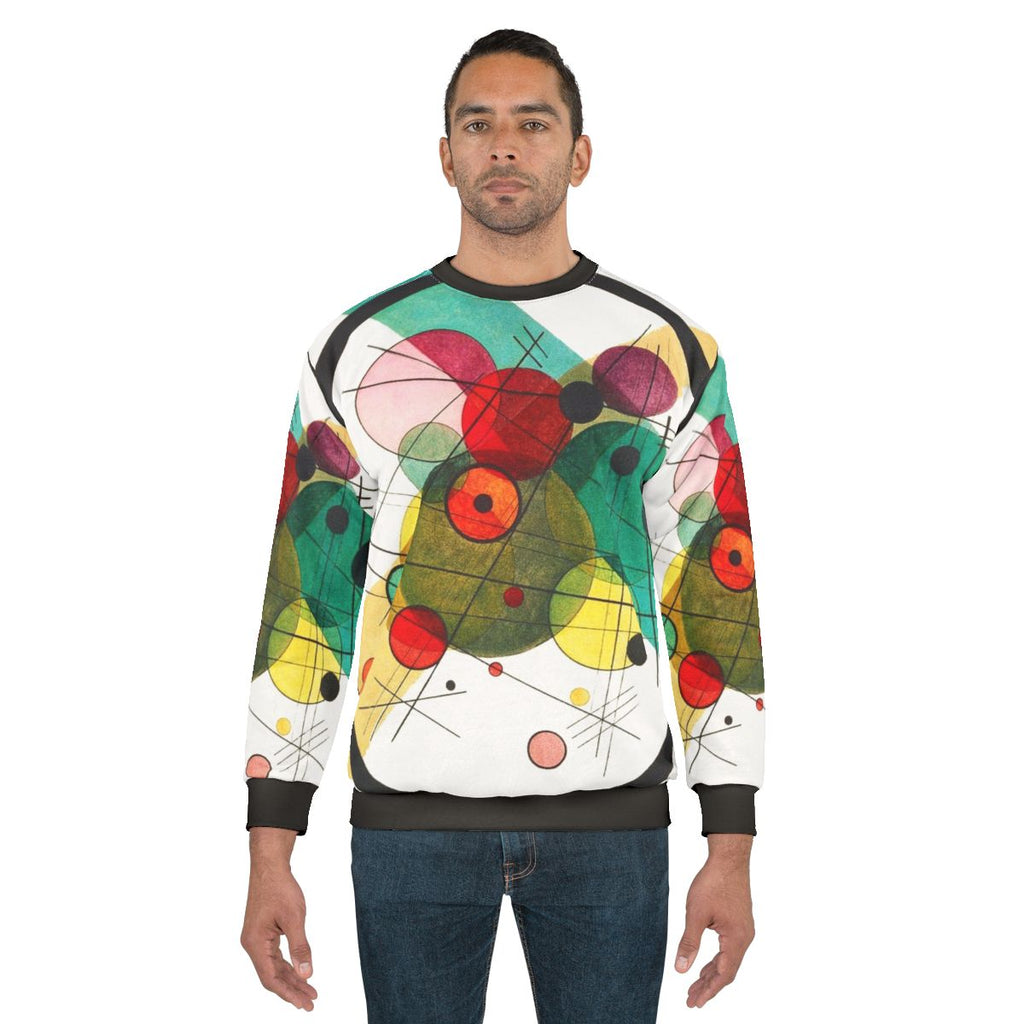Abstract expressionist sweatshirt featuring Wassily Kandinsky's iconic circles design