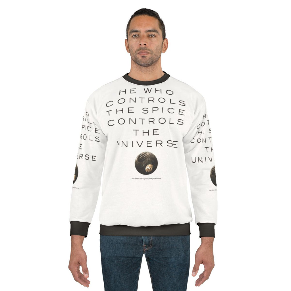 Dune-inspired sweatshirt featuring the quote "He Who Controls The Universe"