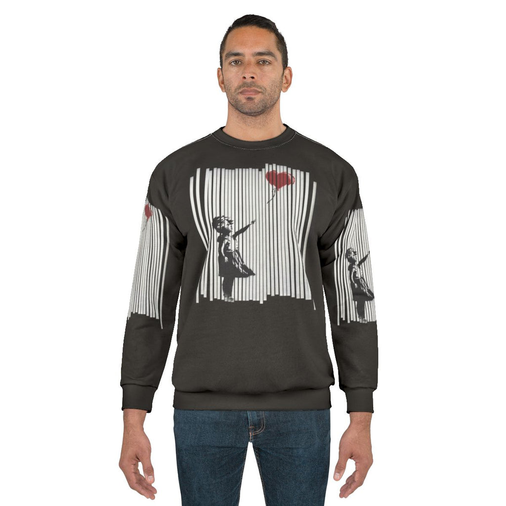 Banksy inspired "Shredded Balloon Girl" graphic sweatshirt