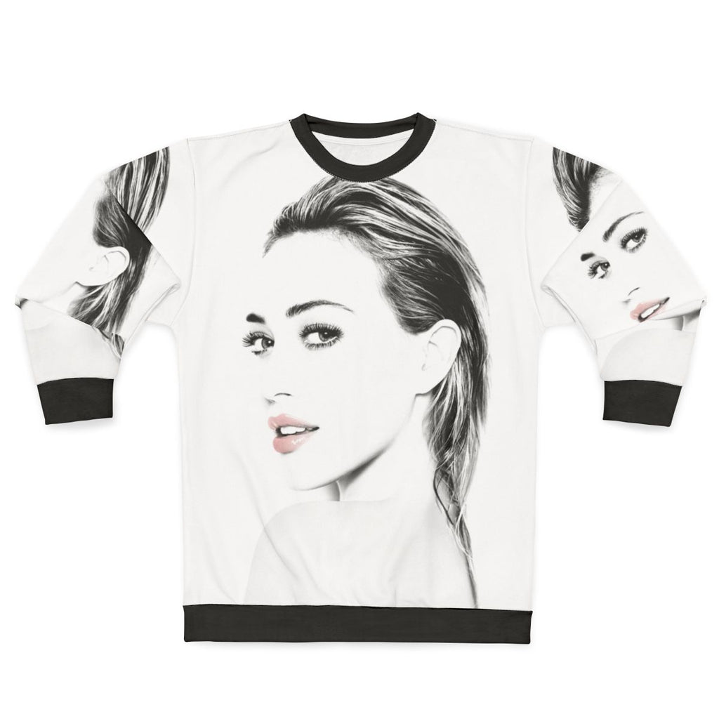 Hilary Duff wearing a gray sweatshirt with a graphic design
