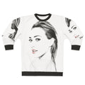 Hilary Duff wearing a gray sweatshirt with a graphic design