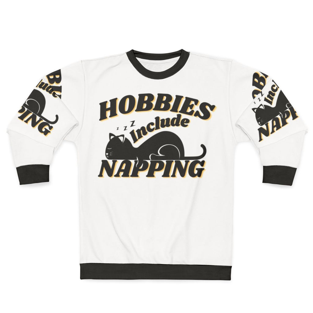 Person wearing a cozy "Hobbies Include Napping" sweatshirt
