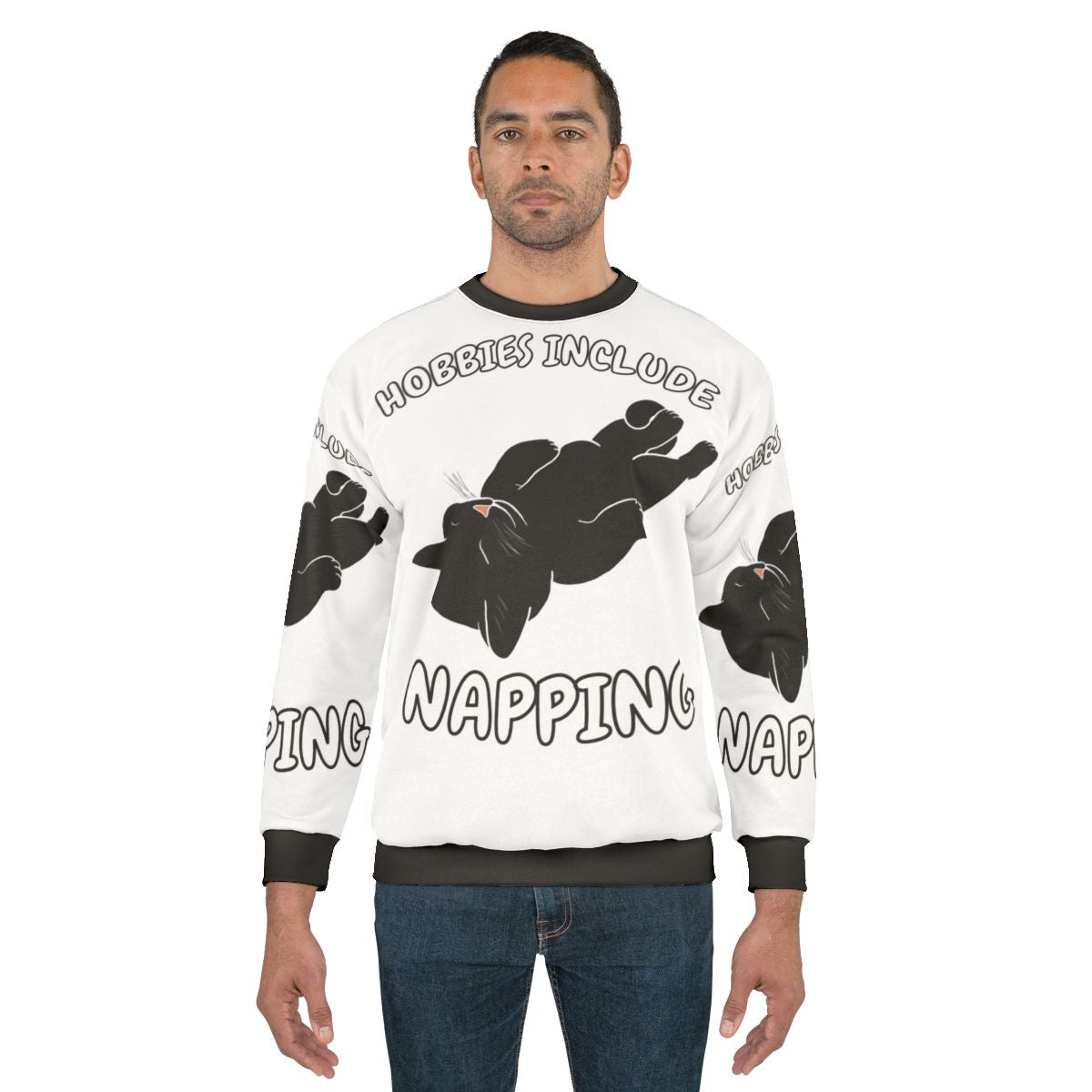 A black cat sweatshirt with the text "Hobbies Include Napping"