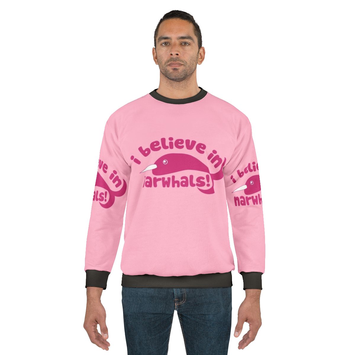 Pink sweatshirt with graphic of a cute narwhal and the text "I Believe in Narwhals"