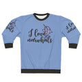 Soft pink and purple sweatshirt with a cute narwhal graphic