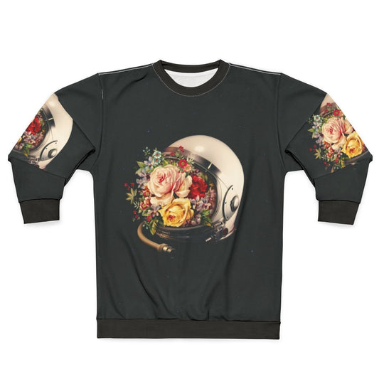 Celestial Bloom Astronaut Sweatshirt featuring a surreal collage of an astronaut, stars, and flowers