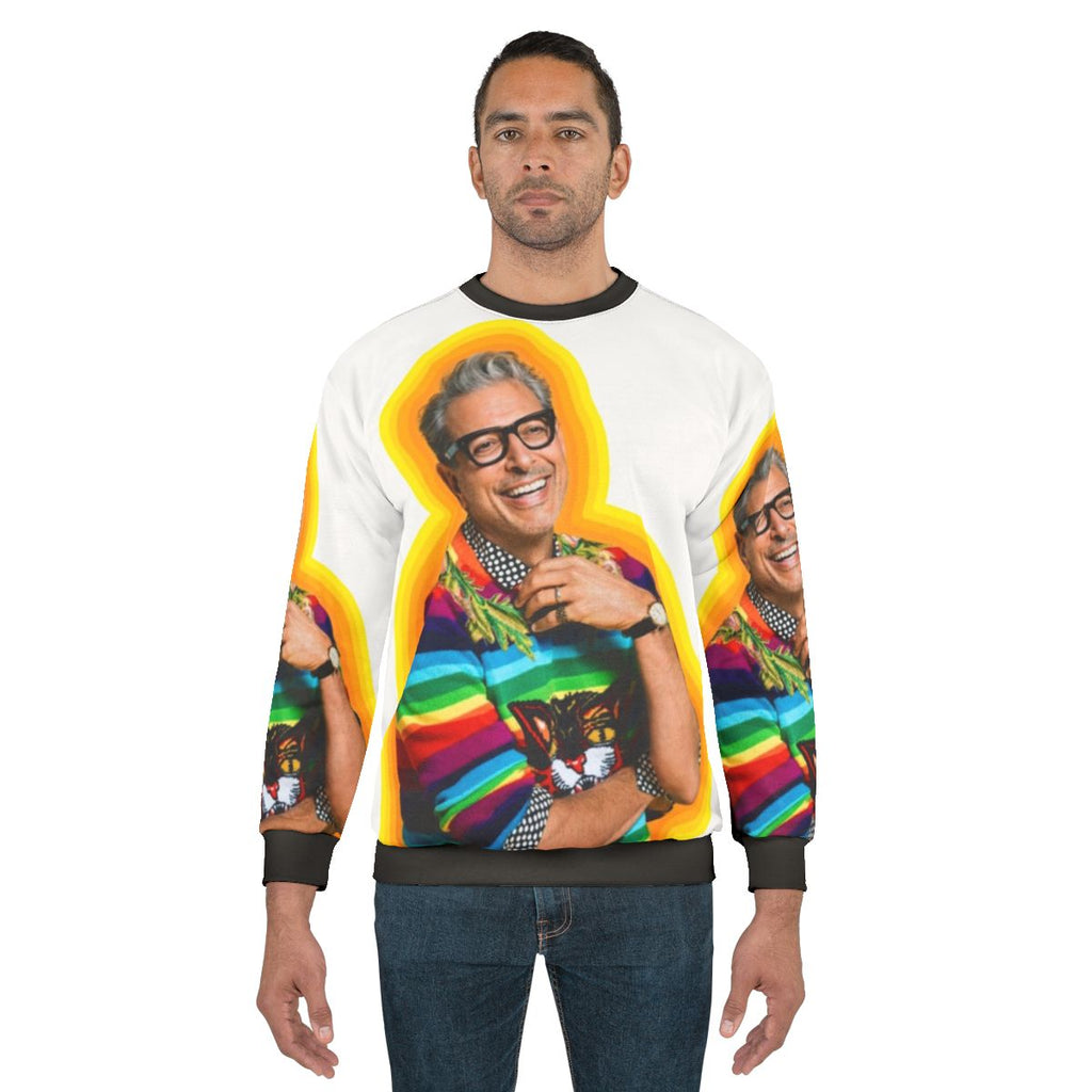 Colorful sweatshirt featuring an image of actor Jeff Goldblum with the text 'Happiness'