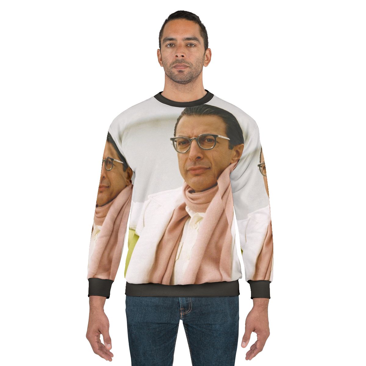 Jeff Goldblum wearing a Jurassic Park themed sweatshirt
