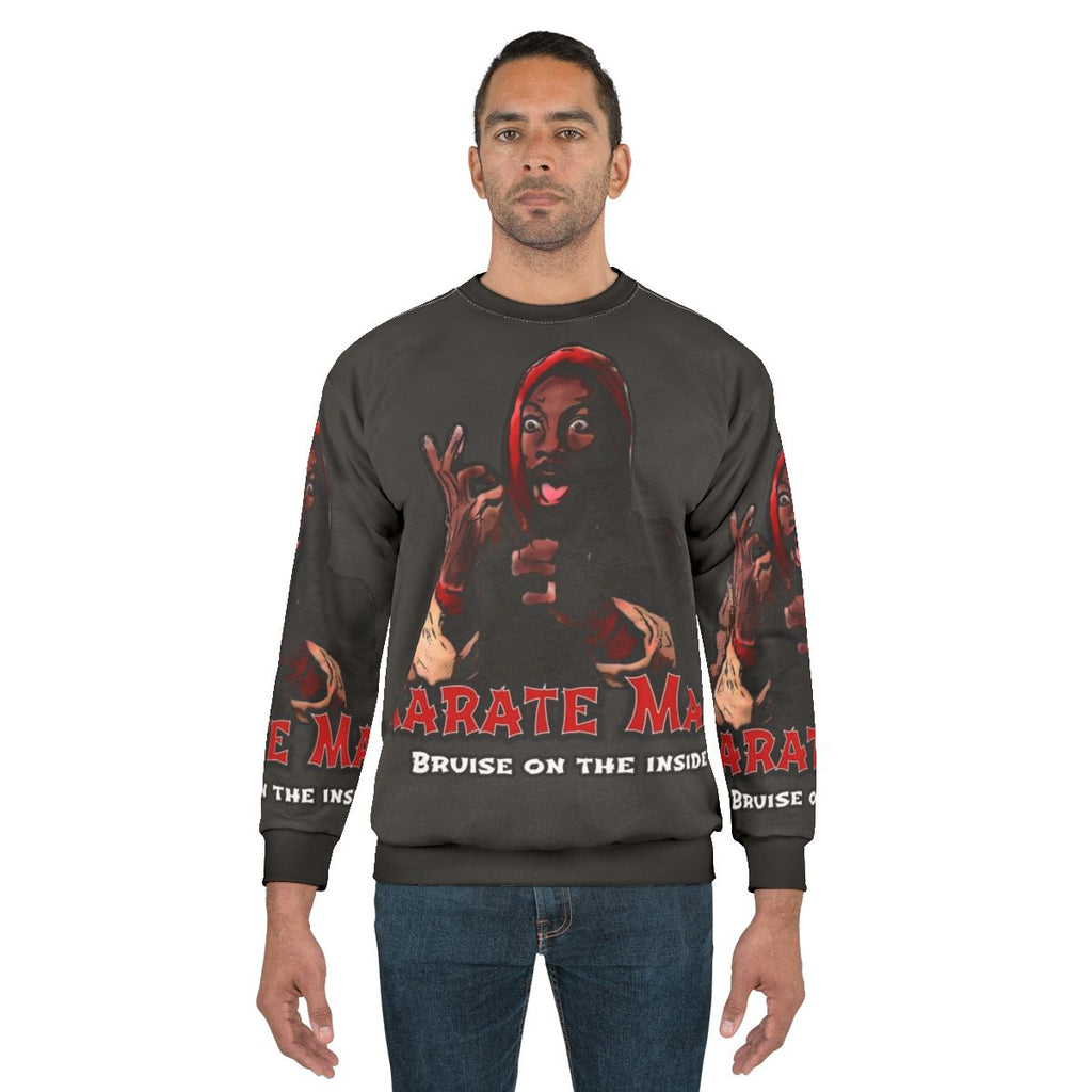 Karate Man Sweatshirt featuring classic 80s Christmas movie characters