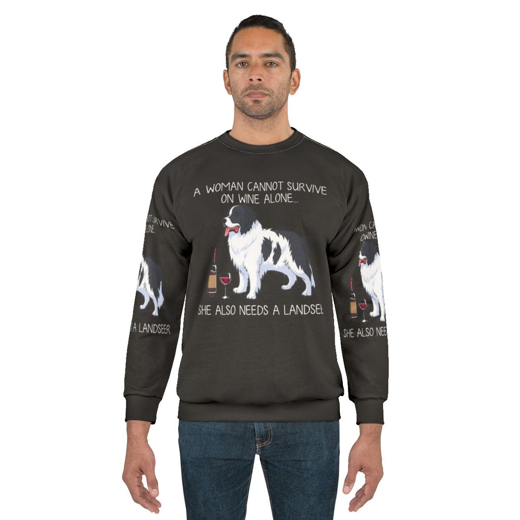 Landseer dog wearing a funny sweatshirt with wine