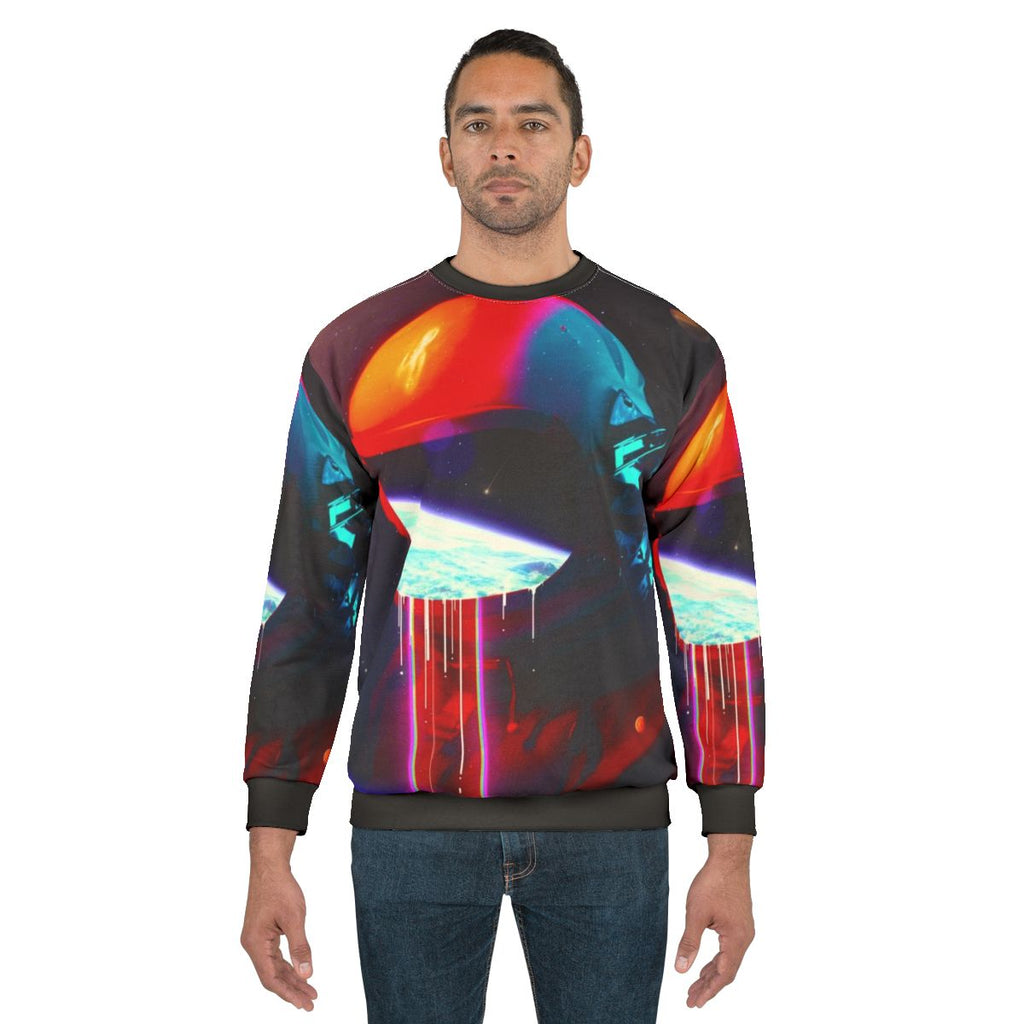 Cosmic leaking sweatshirt with surreal space exploration design