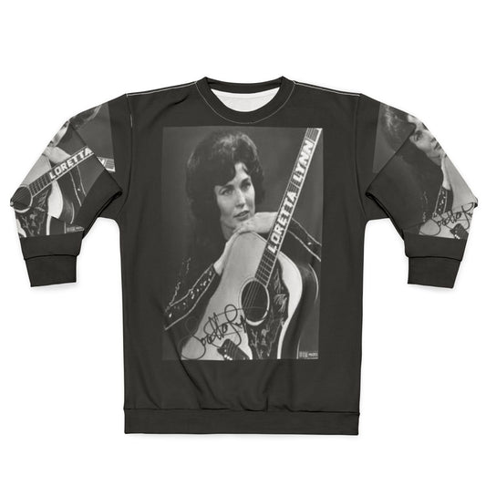 Loretta Lynn wearing a vintage-style sweatshirt with her country music photos