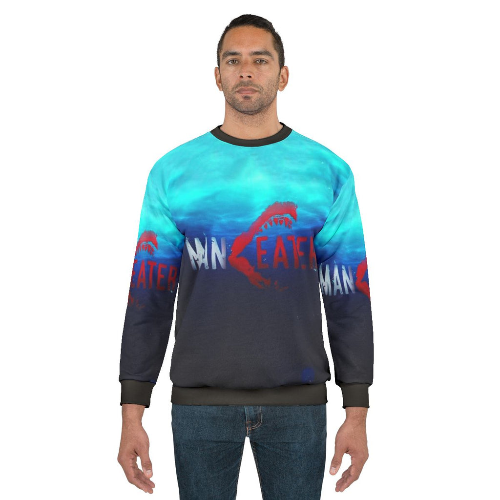 Maneater Survival Sweatshirt featuring a shark design