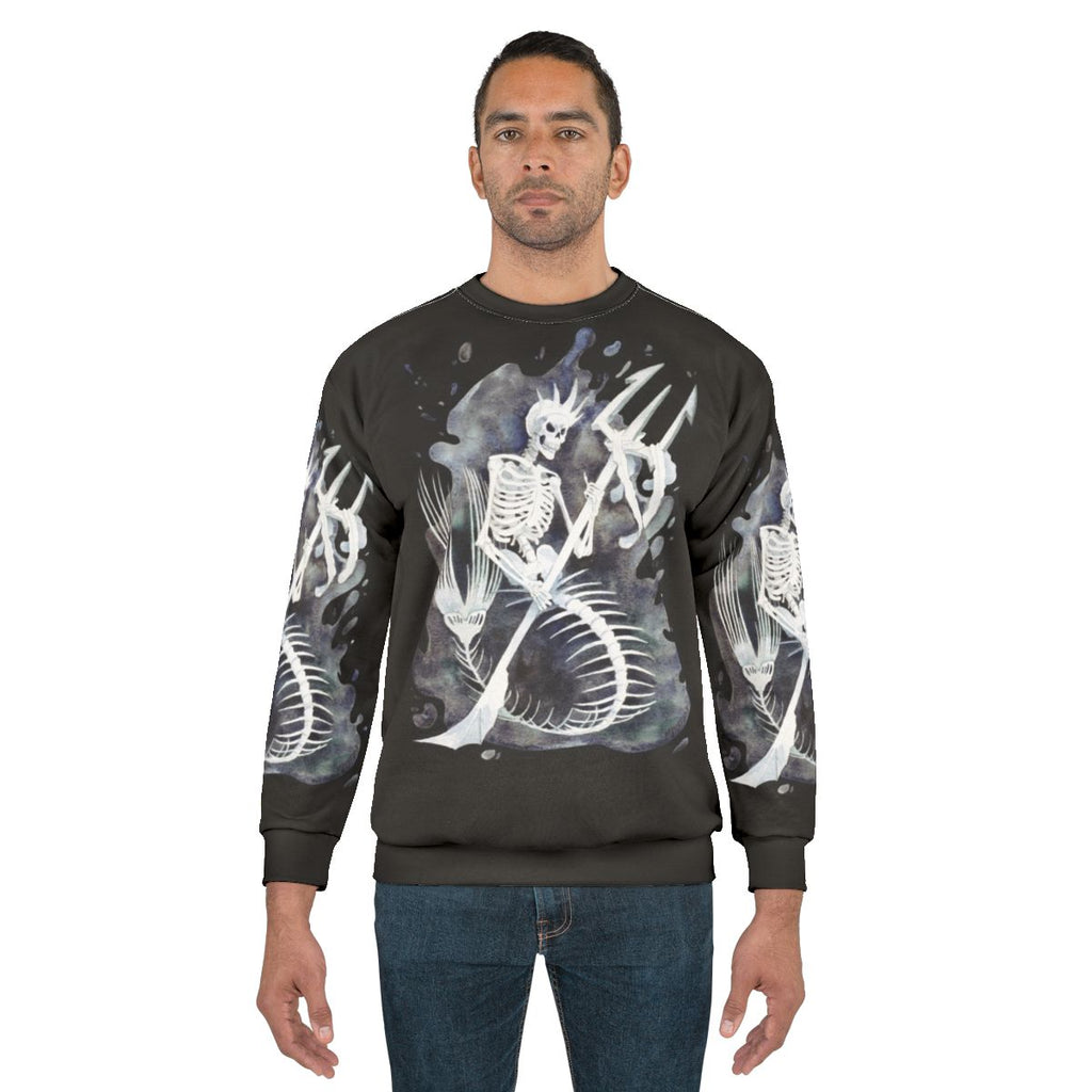 Mermaid skeleton design on a cozy black sweatshirt