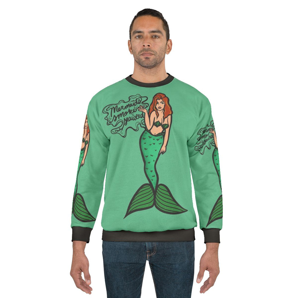Mermaid smoking seaweed print on a cozy sweatshirt