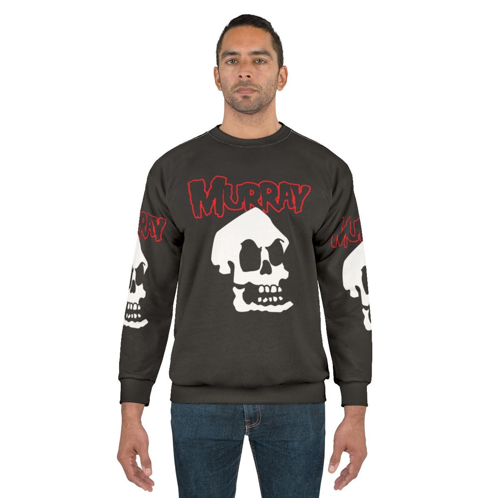 Misfit Murray retro gaming sweatshirt featuring pixel art of Guybrush Threepwood from Monkey Island