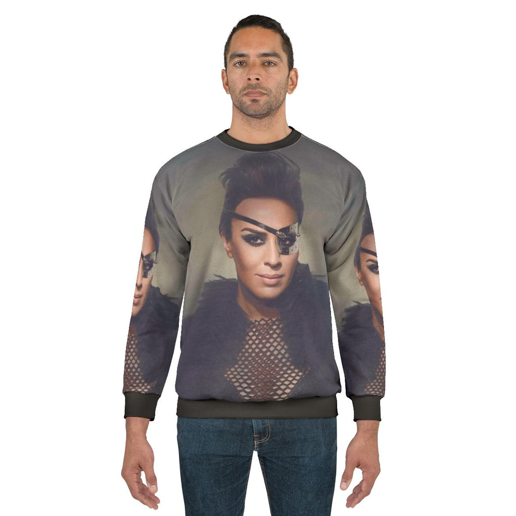 Monica Naranjo Orange Sweatshirt with Music Icon Design