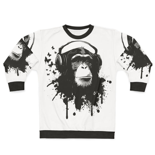 Stylish monkey business sweatshirt with vibrant splatter pattern and animal graphics