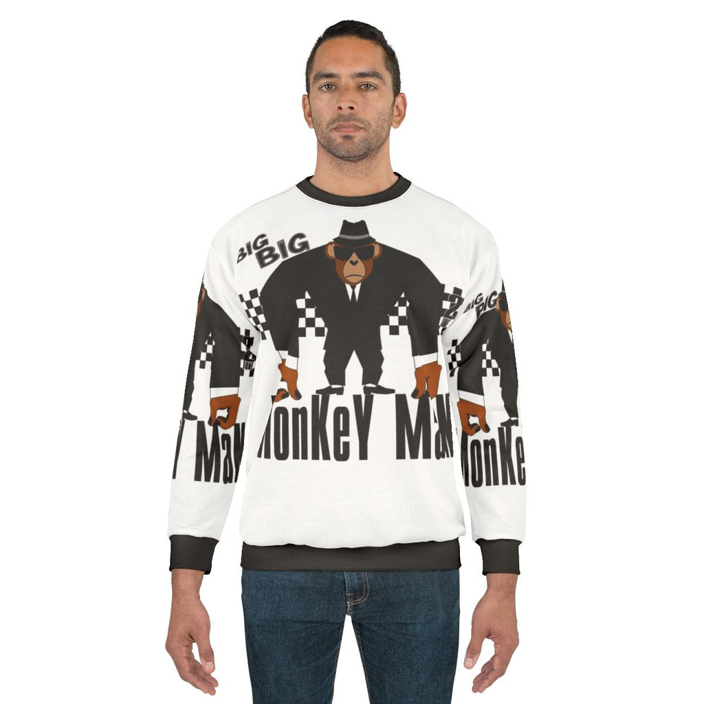Monkey man graphic on a cozy ska inspired sweatshirt