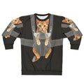 Monty the cat wearing a baby carrier on a sweatshirt