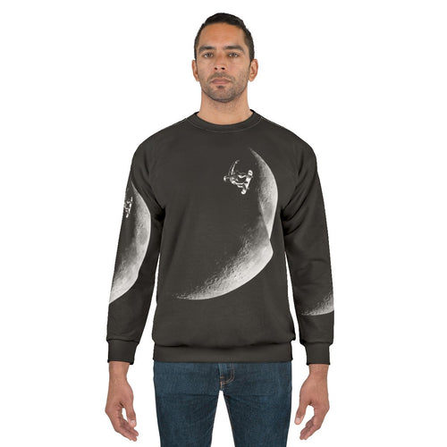 Astronaut skateboarding in the galaxy on a black and white sweatshirt
