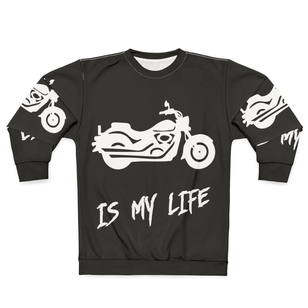 Motorcycle enthusiast wearing a sweatshirt with "Motorcycle Is My Life" printed on it.