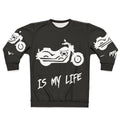 Motorcycle enthusiast wearing a sweatshirt with "Motorcycle Is My Life" printed on it.