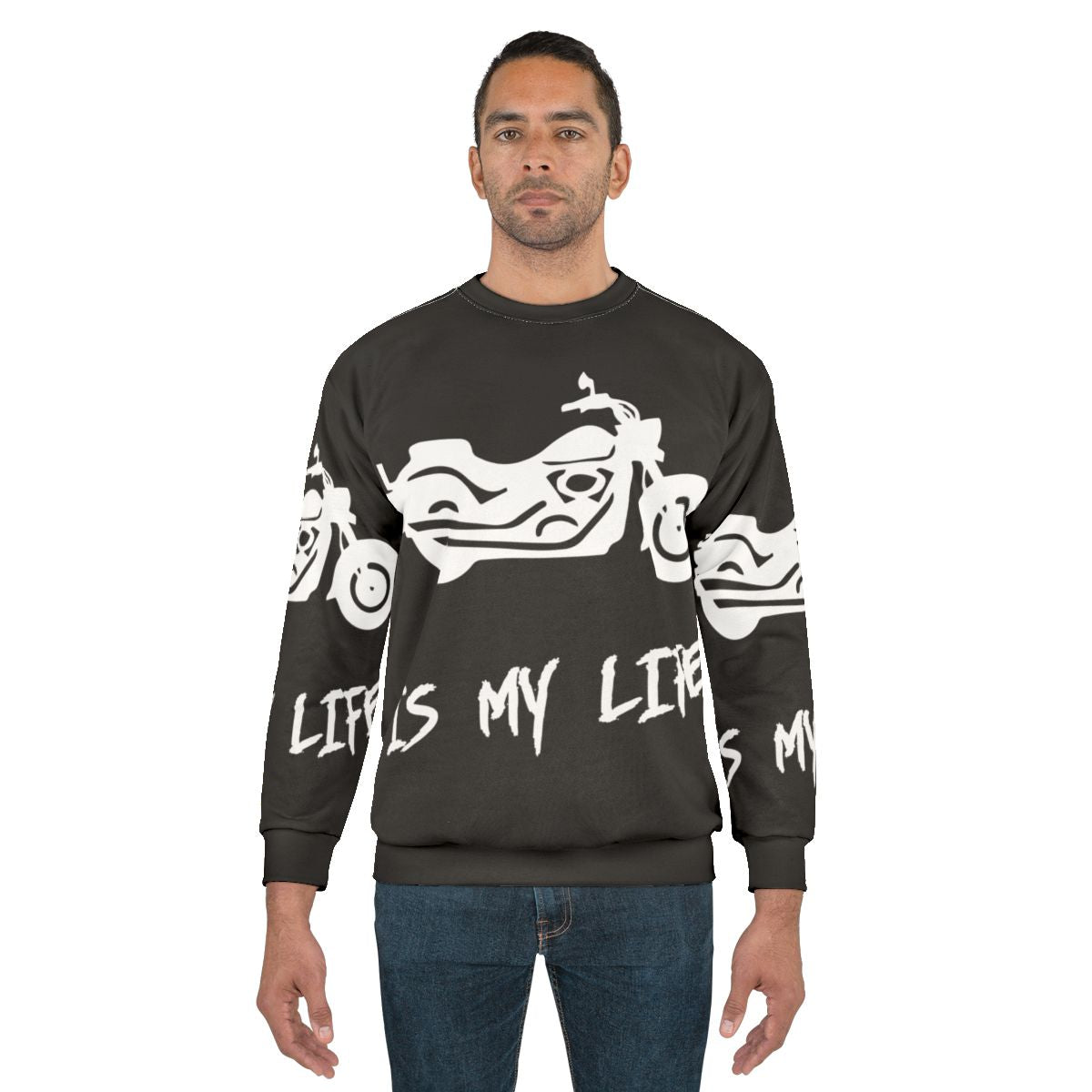 Motorcycle enthusiast wearing a sweatshirt with "Motorcycle Is My Life" printed on it.