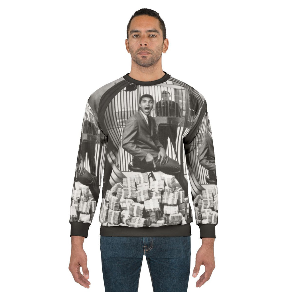 Muhammad Ali, the greatest boxer, wearing a commemorative sweatshirt