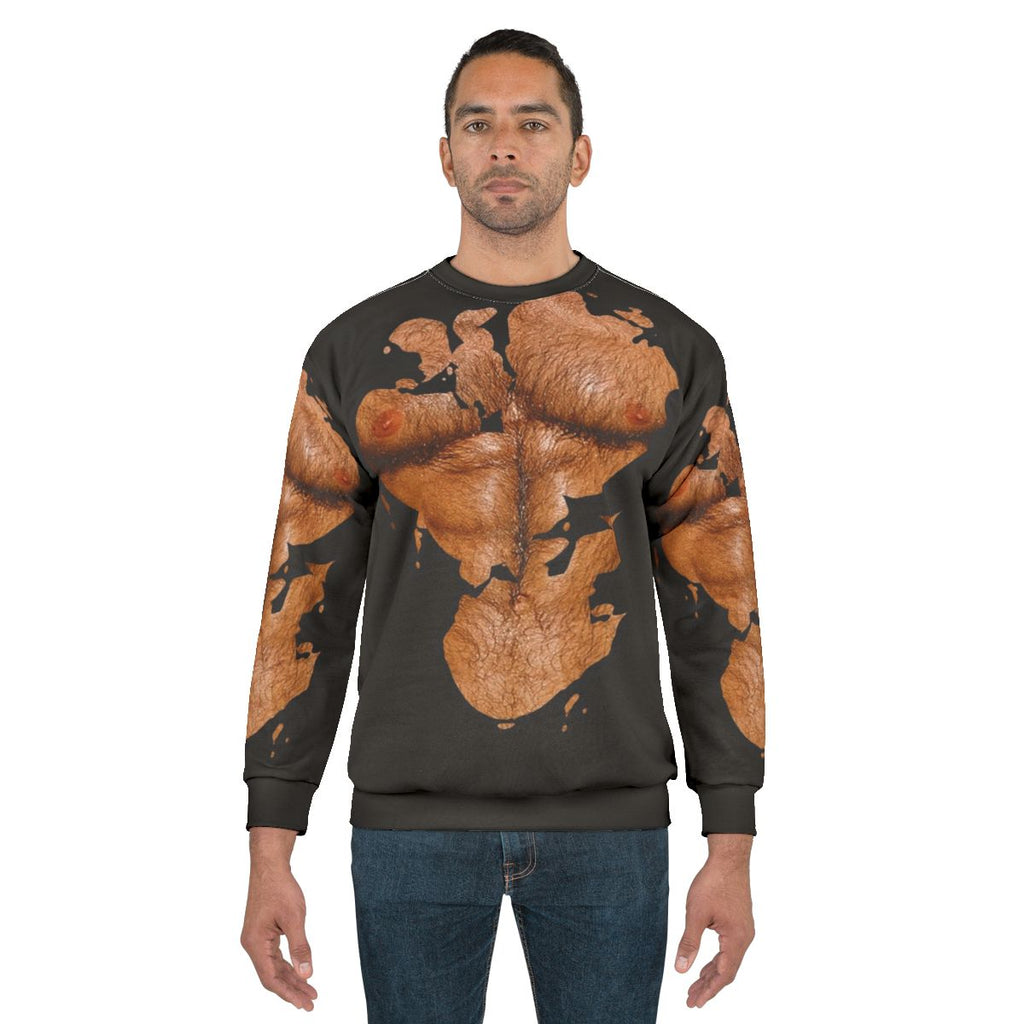 Muscular, hairy-chested man wearing sweatshirt