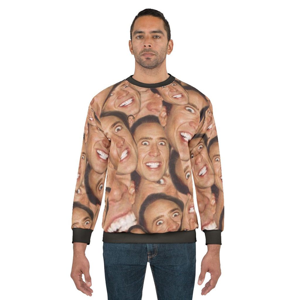 Nicolas Cage face collage design on a sweatshirt