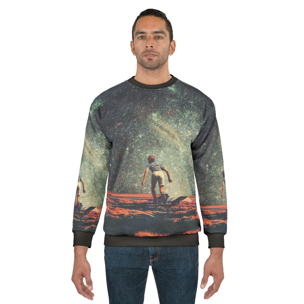 Nostalgia vintage graphic sweatshirt featuring a colorful collage design with space, stars, and retro elements