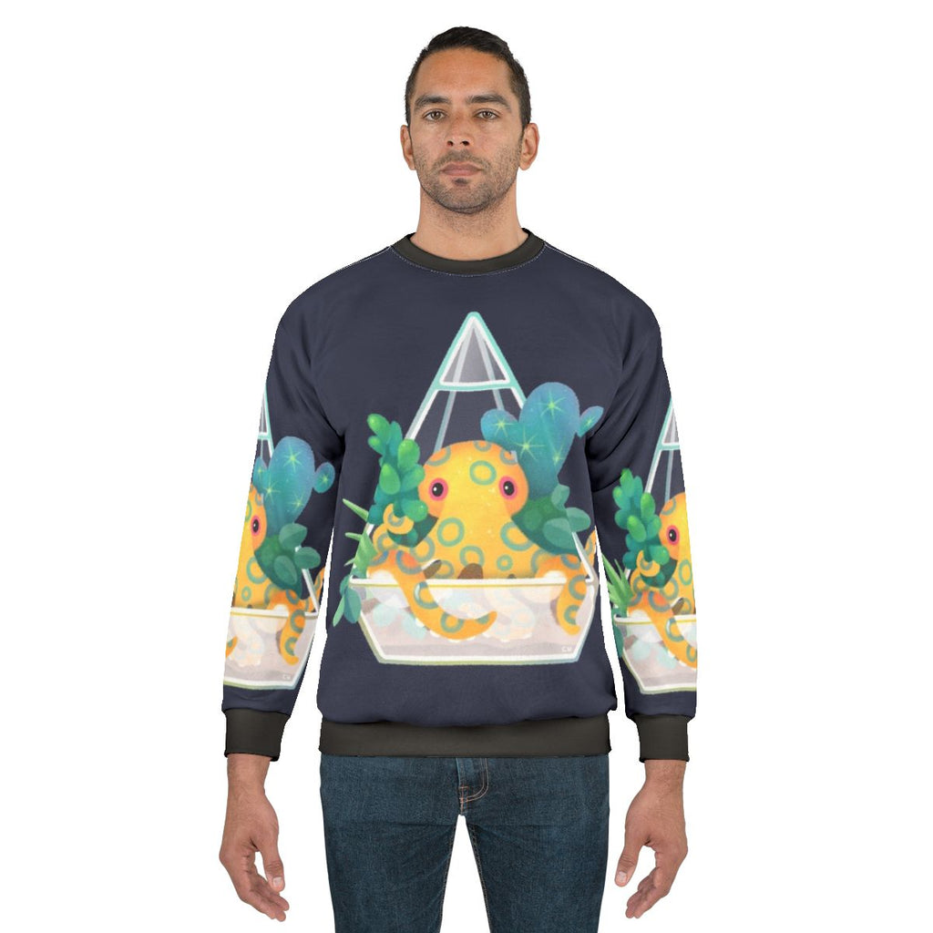 Blue ringed octopus in an ocean terrarium design on a sweatshirt