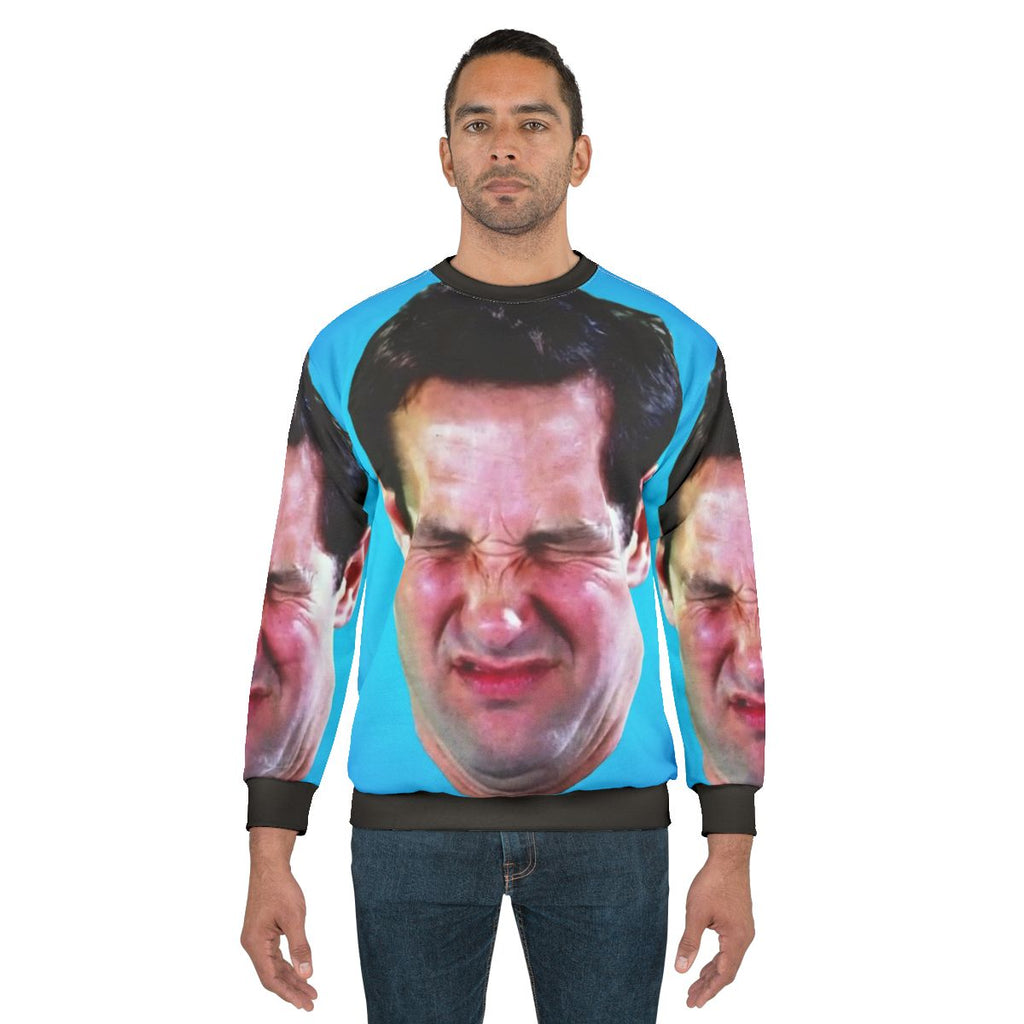 Paul Rudd working hard on his computer wearing a Tayne sweatshirt