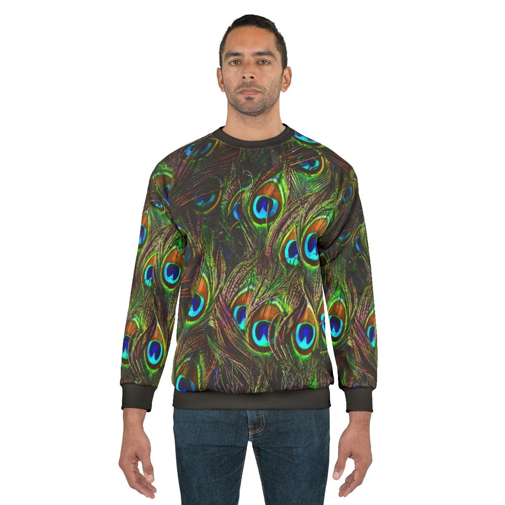 Peacock feather sweatshirt with vibrant, nature-inspired design